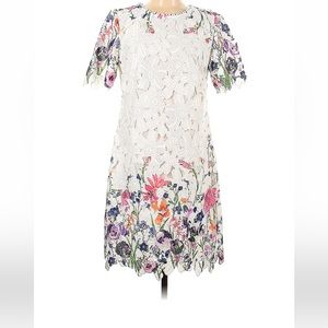 White embroidered cocktail dress. White lace dress. White floral dress.